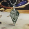 Hand-cut moss agate arrow pendant with pointed faceted outline and silver-colored loop