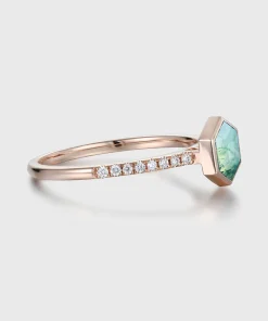 Side view of hexagon moss agate ring showing raised bezel and accent-set shoulders