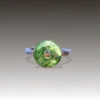 Front design rendering of donut moss agate ring with open circular gemstone