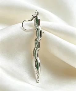 Side view of honeycomb moss agate earring showing gemstone frames and ear hook