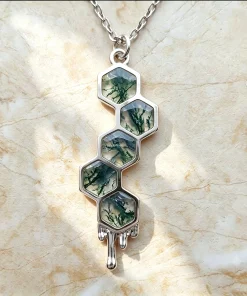 Honeycomb moss agate pendant with five hexagonal stones and a silver-colored chain