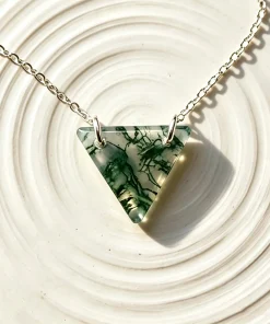 Close view of triangle moss agate necklace showing branching green inclusions