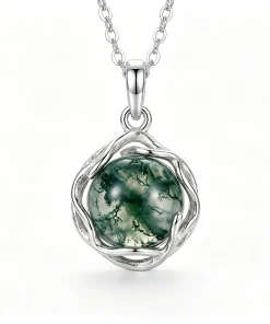 Round moss agate pendant surrounded by an organic vine-like metal frame