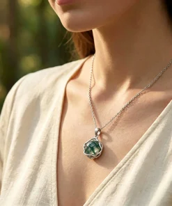 Organic moss agate necklace worn with an ivory top