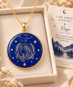Virgo zodiac necklace featuring a polished natural lapis lazuli pendant with gold Virgo constellation design, displayed in an ivory jewelry box with a matching zodiac gift card