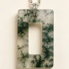 Front view of Infinity Frame moss agate pendant with rectangular open center and silver-colored chain