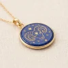 Front angled view of Aries lapis lazuli pendant with gold-colored ram and stars