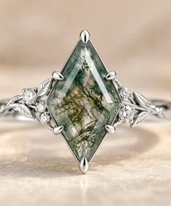 Front view of kite moss agate ring with white gold leaf details and lab-grown diamond accents