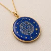 Front angled view of Leo lapis lazuli pendant with gold-colored lion and stars