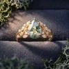 Front view of Sylvan Leaf pear moss agate ring with gold leaves and lab-grown diamonds