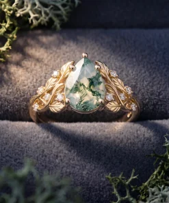 Front view of Sylvan Leaf pear moss agate ring with gold leaves and lab-grown diamonds